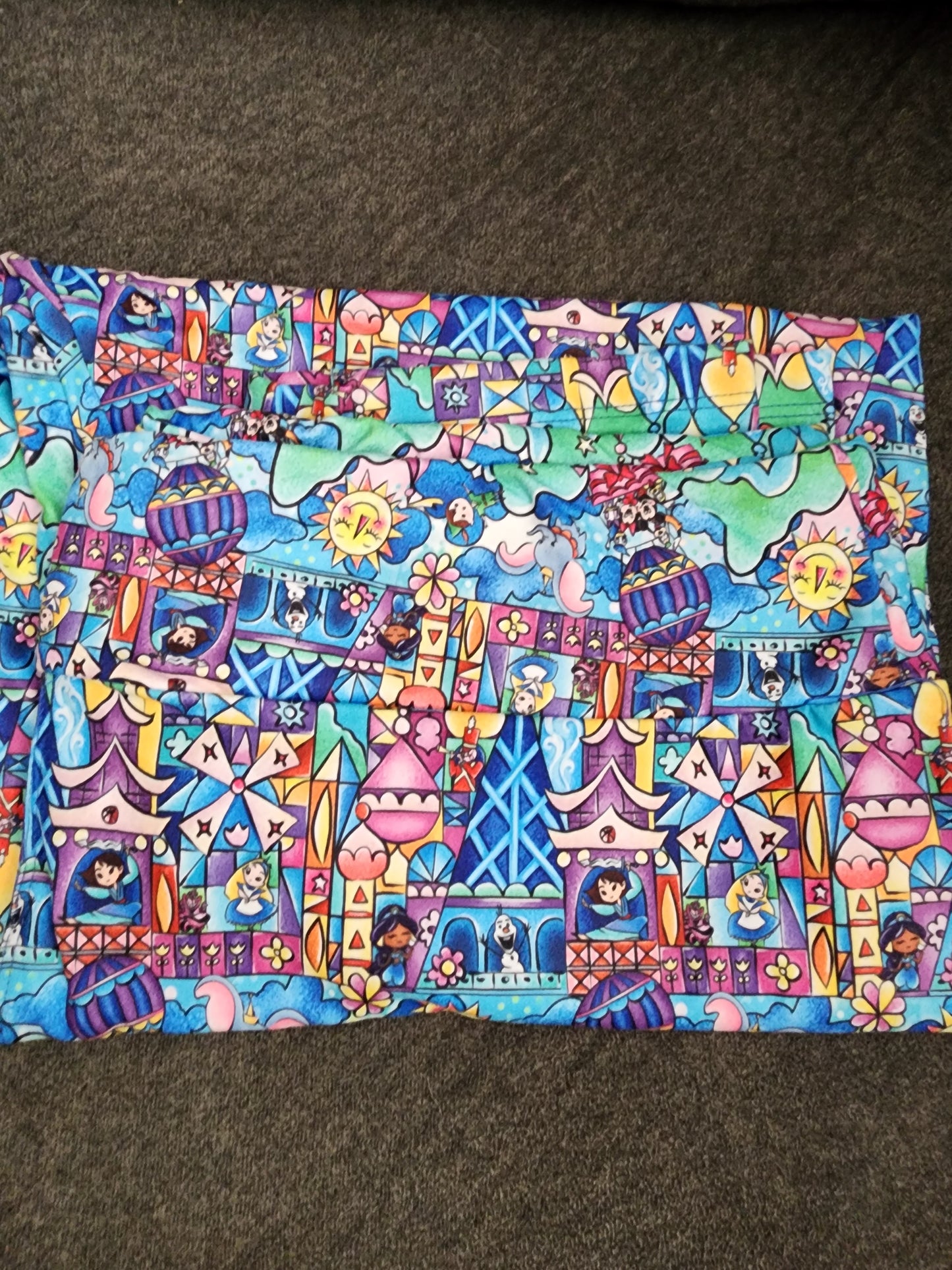 CP Disney It's a Small World Movie Characters Capri Leggings