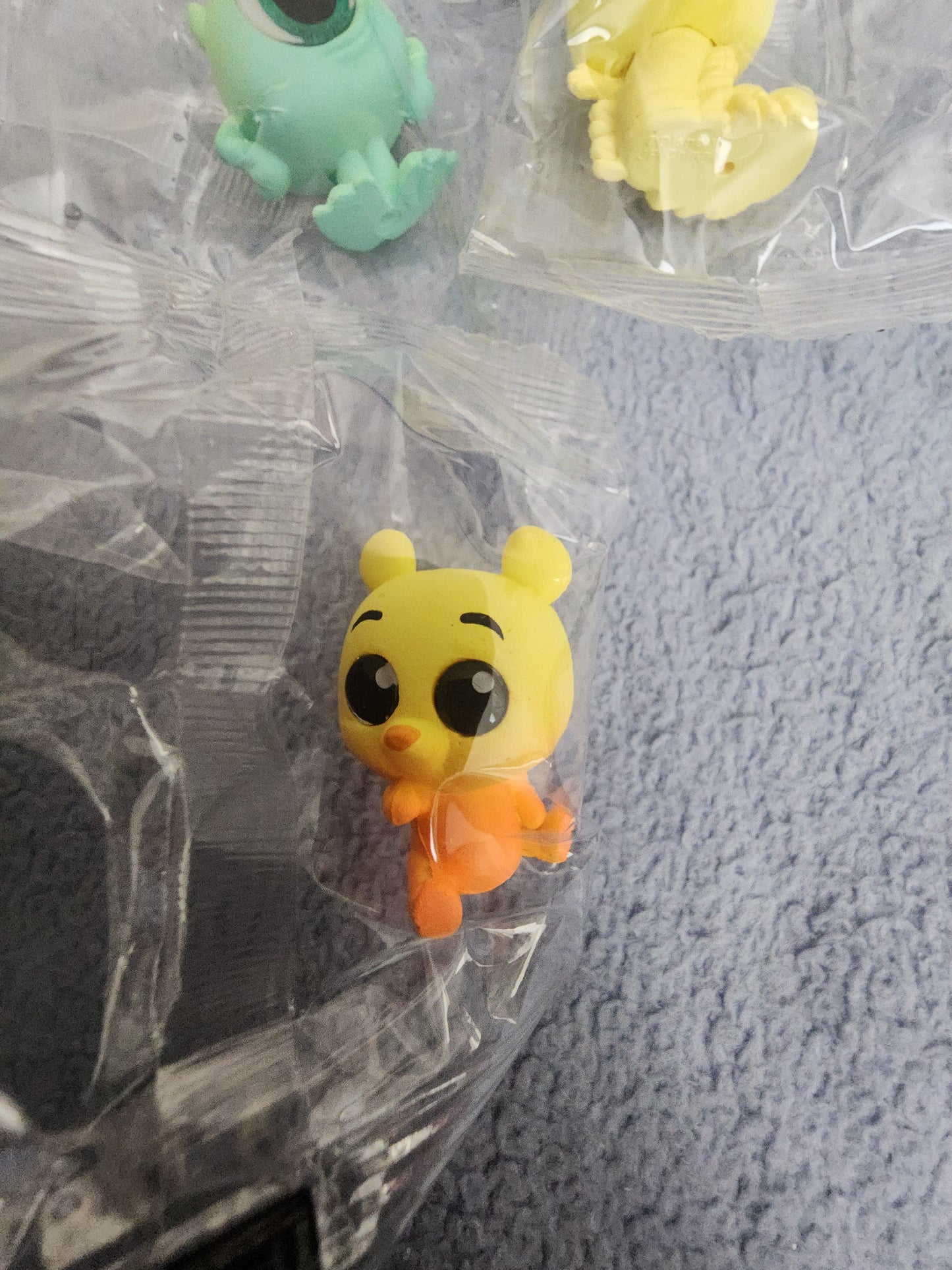 Disney Easter Doorables Caterpillar, Pooh, and Mike Mystery Figures