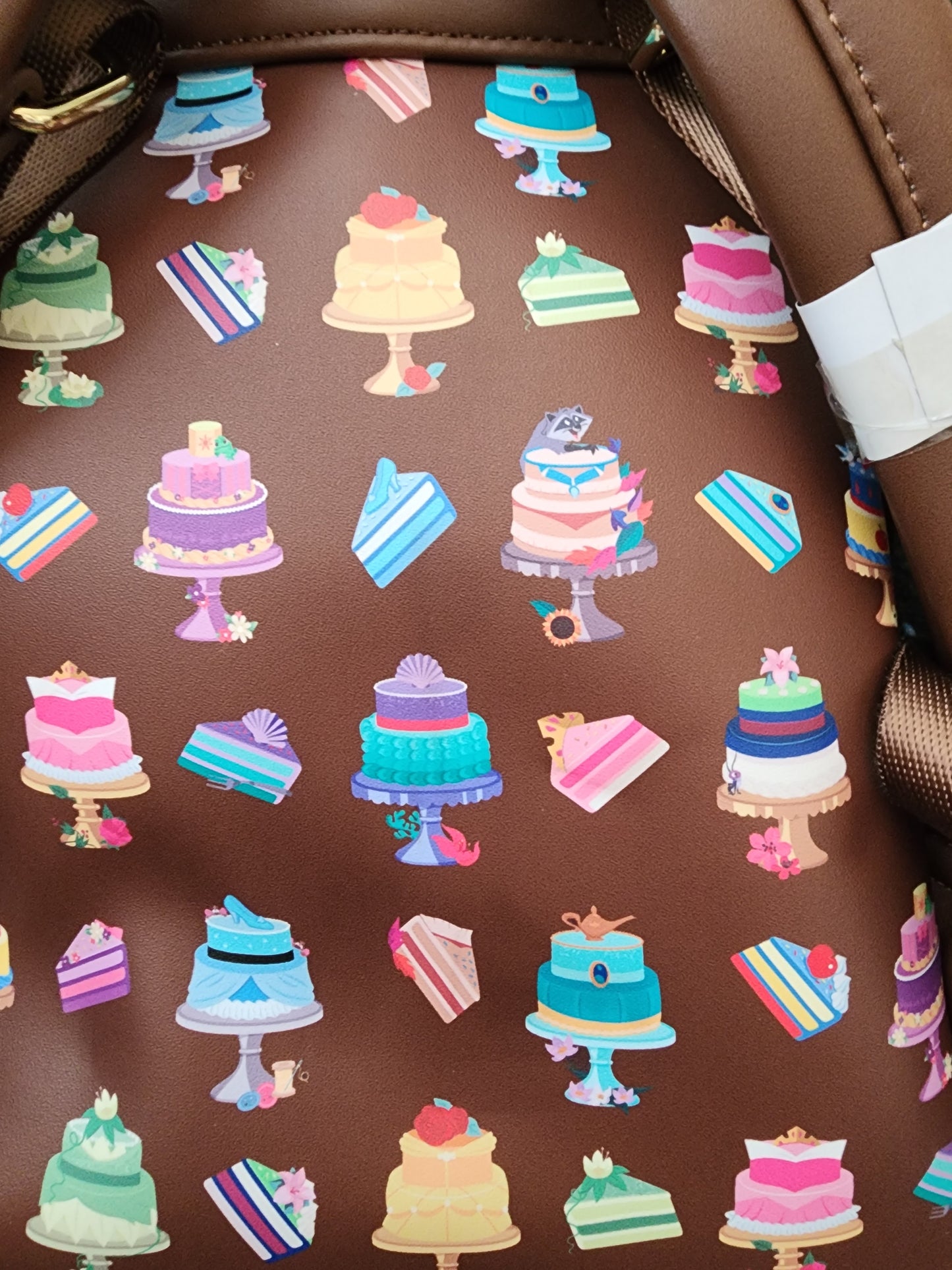 Loungefly Disney Princess Dress Cakes on Chocolate Frosting Backpack