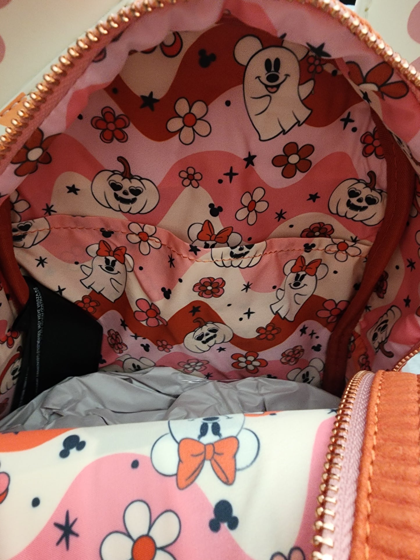 Loungefly Disney Minnie Mouse Ghost Holding a Pumpkin Backpack