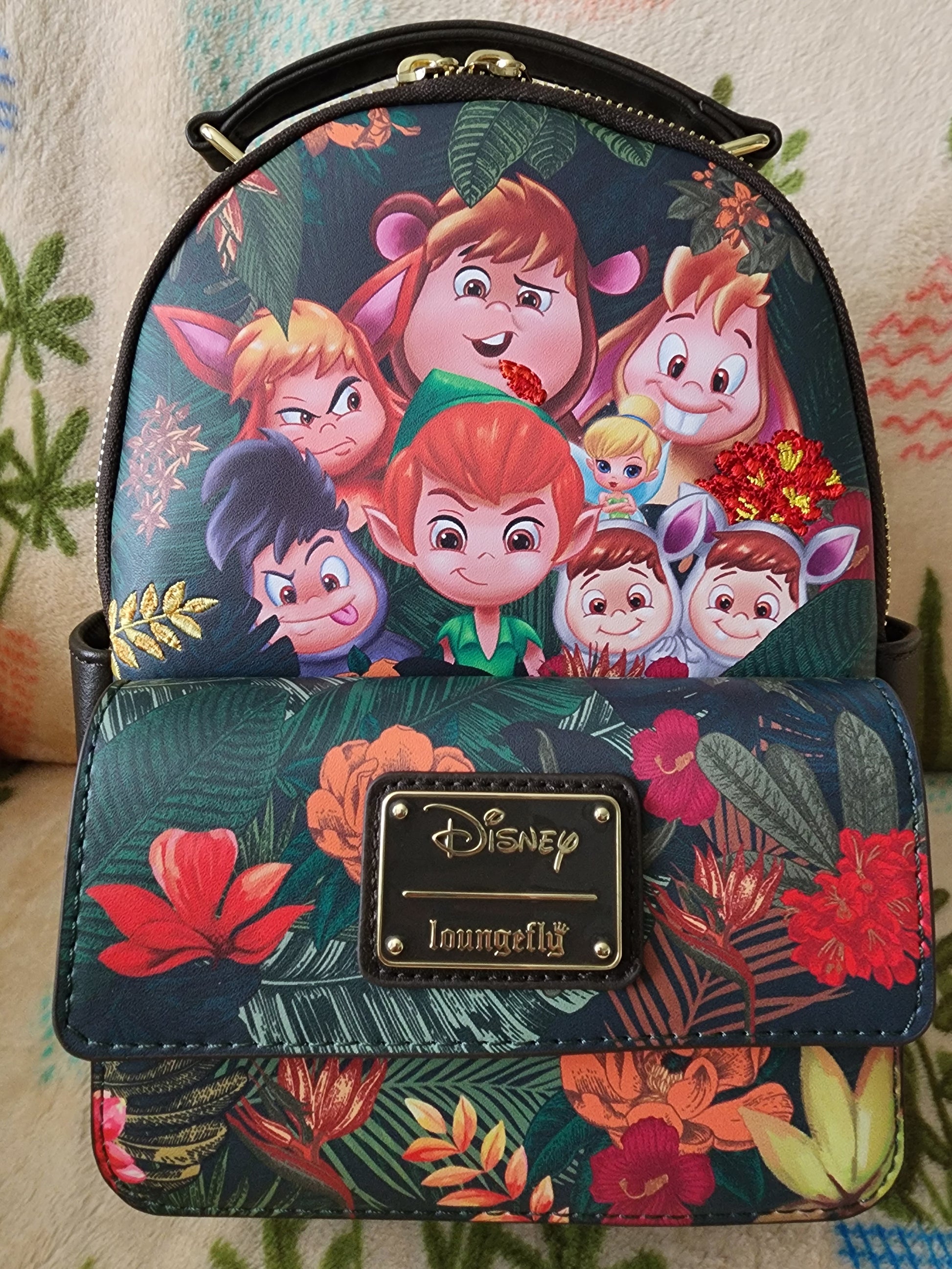disney mini backpack peter pan Loungefly Disney Peter Pan and Lost Boys Floral Backpack – Gwen's Mermaid Cove